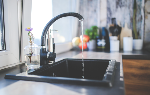 Kitchen sink with running water